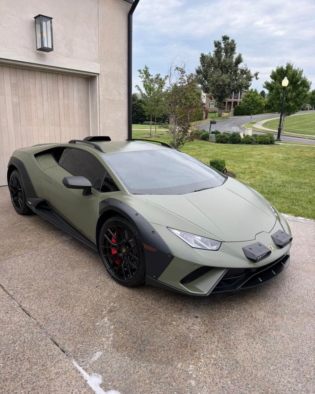 Matte green Lamborghini Huracán after a detail